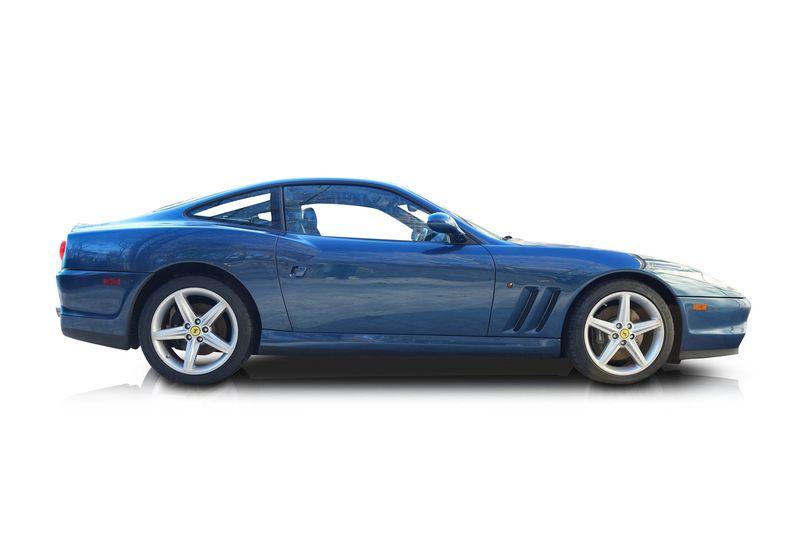 An incredible side shot photo of aFerrari 575M that you should buy.