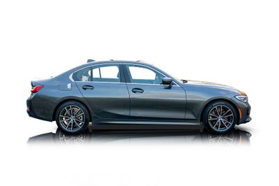 Passenger side photo of 2021 BMW 330e