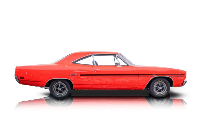 An incredible side shot photo of aPlymouth GTX that you should buy.