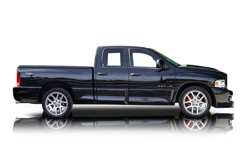 An incredible side shot photo of aDodge Ram 1500 that you should buy.