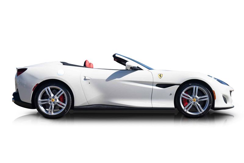 An incredible side shot photo of aFerrari Portofino that you should buy.