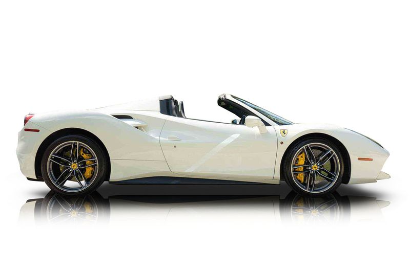 An incredible side shot photo of aFerrari 488 Spider that you should buy.