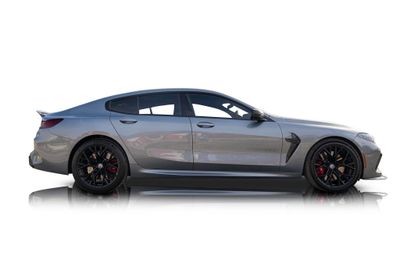 Passenger side photo of 2023 BMW M8