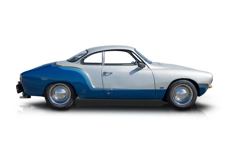 An incredible side shot photo of aVolkswagen Karmann Ghia that you should buy.