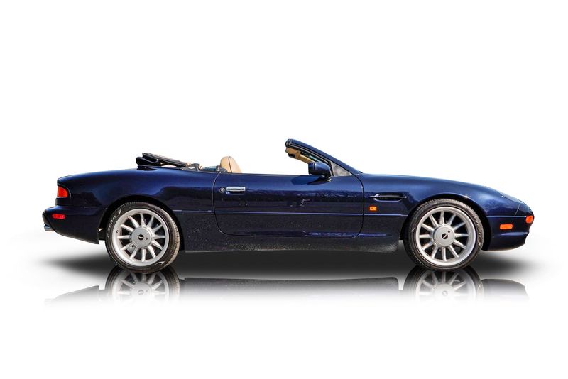 An incredible side shot photo of aAston Martin DB7 that you should buy.