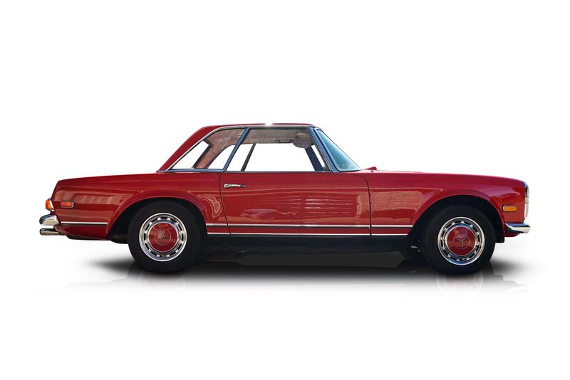 An incredible side shot photo of aMercedes-Benz 280SL that you should buy.