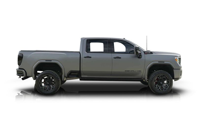 An incredible side shot photo of aGMC Sierra 2500 that you should buy.