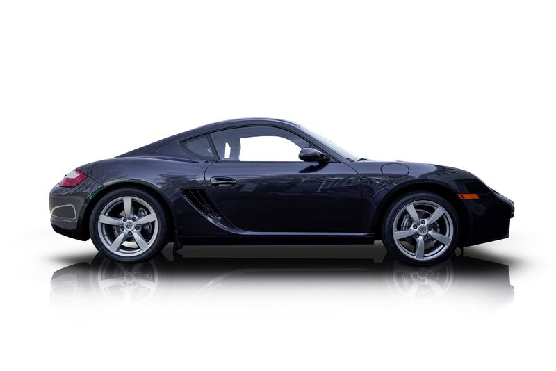 An incredible side shot photo of aPorsche Cayman that you should buy.