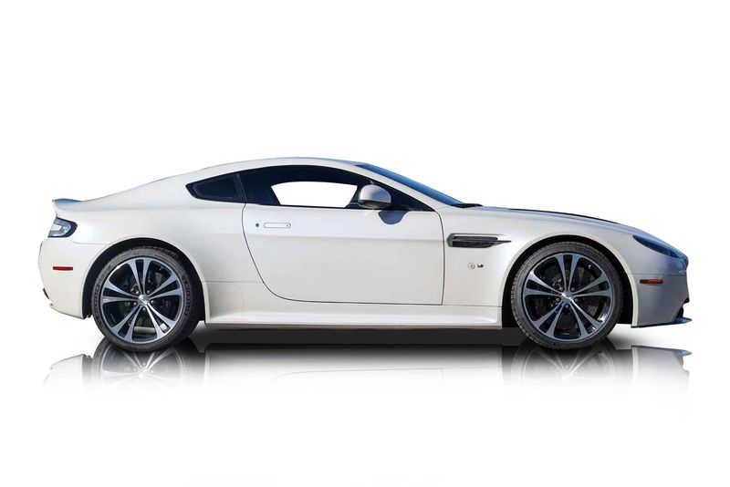 An incredible side shot photo of aAston Martin V12 Vantage that you should buy.