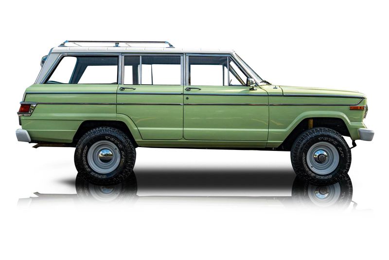 An incredible side shot photo of aJeep Wagoneer that you should buy.