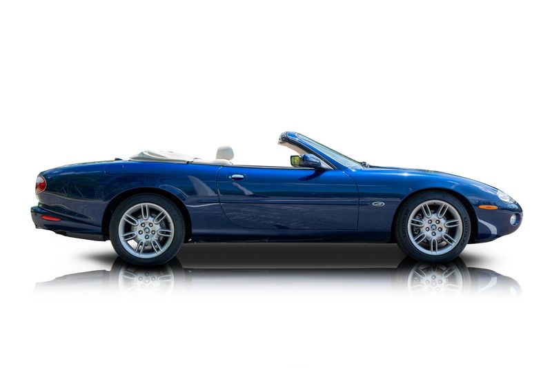 An incredible side shot photo of aJaguar XK that you should buy.
