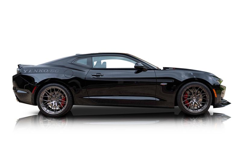 An incredible side shot photo of a car that you should buy.