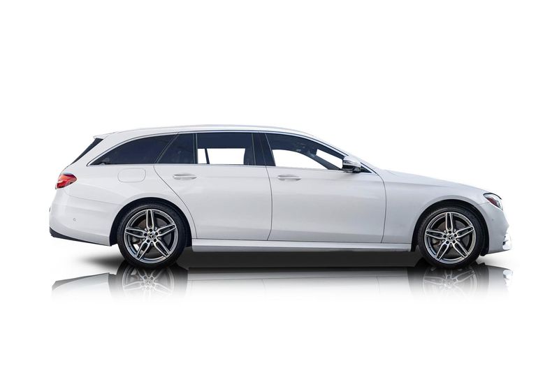 An incredible side shot photo of aMercedes-Benz E450 that you should buy.