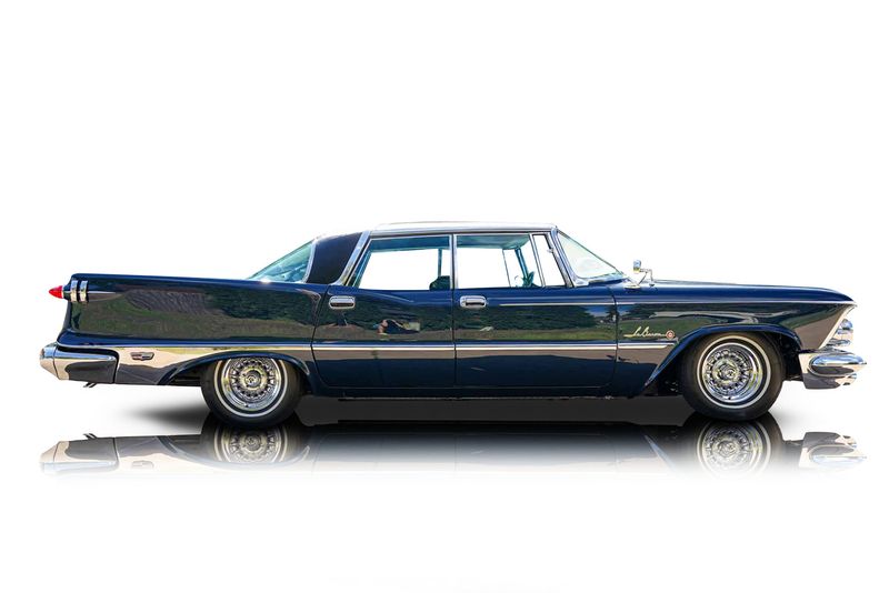 An incredible side shot photo of aChrysler Imperial that you should buy.