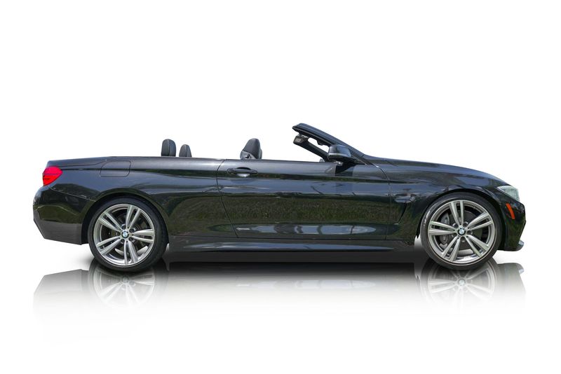 An incredible side shot photo of aBMW 435i that you should buy.