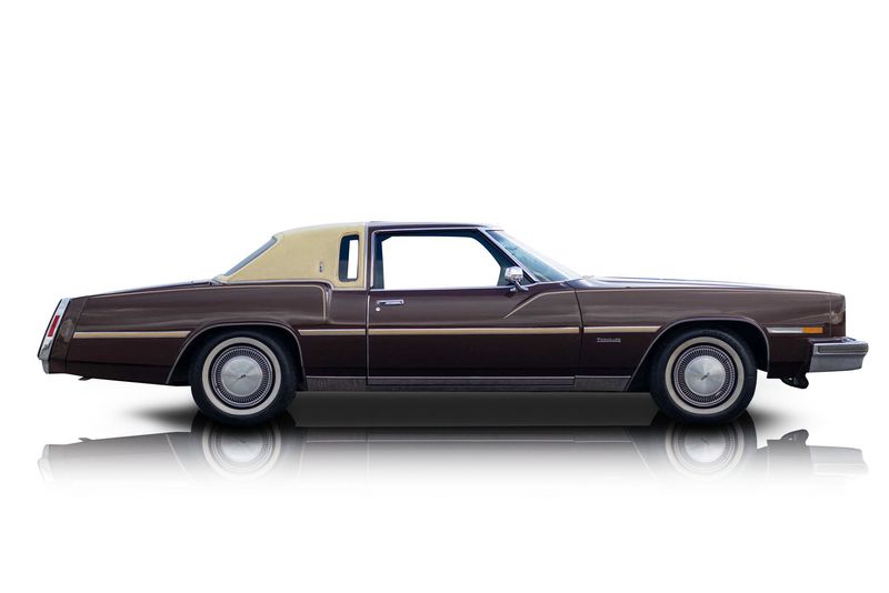 An incredible side shot photo of aOldsmobile Toronado that you should buy.