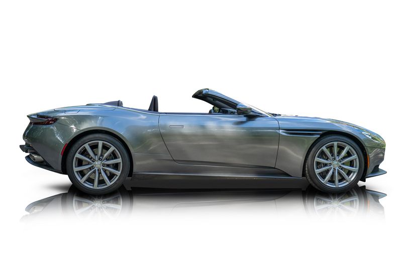 An incredible side shot photo of aAston Martin DB11 that you should buy.