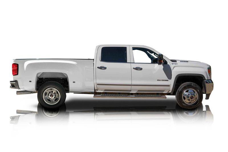 An incredible side shot photo of aGMC Sierra 3500 that you should buy.