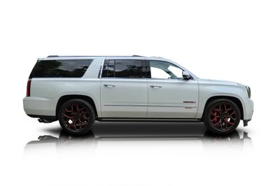 Passenger side photo of 2020 GMC Yukon