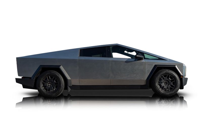 An incredible side shot photo of aTesla Cybertruck that you should buy.