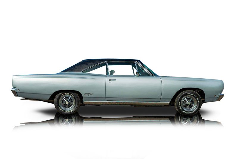 An incredible side shot photo of aPlymouth GTX that you should buy.