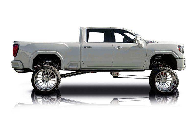 An incredible side shot photo of aGMC Sierra 2500 that you should buy.