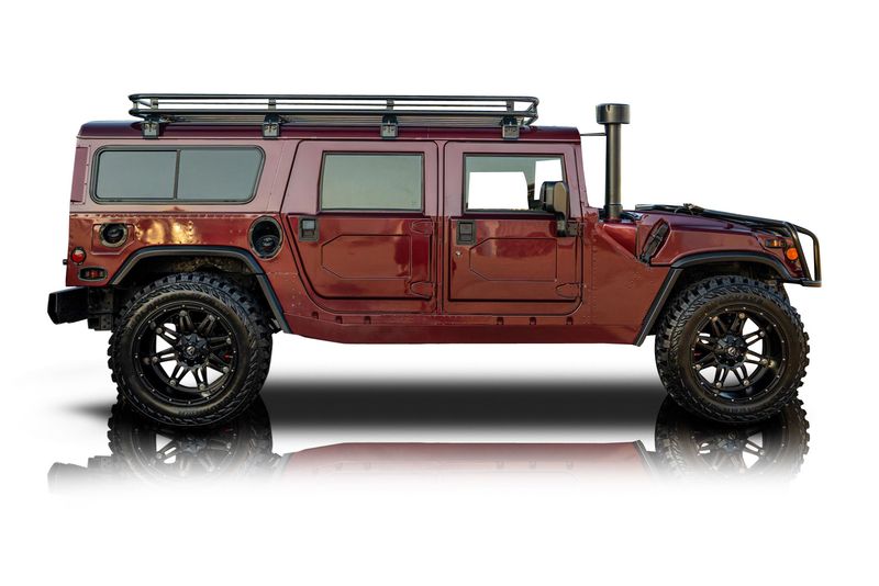 An incredible side shot photo of aAM General Hummer that you should buy.
