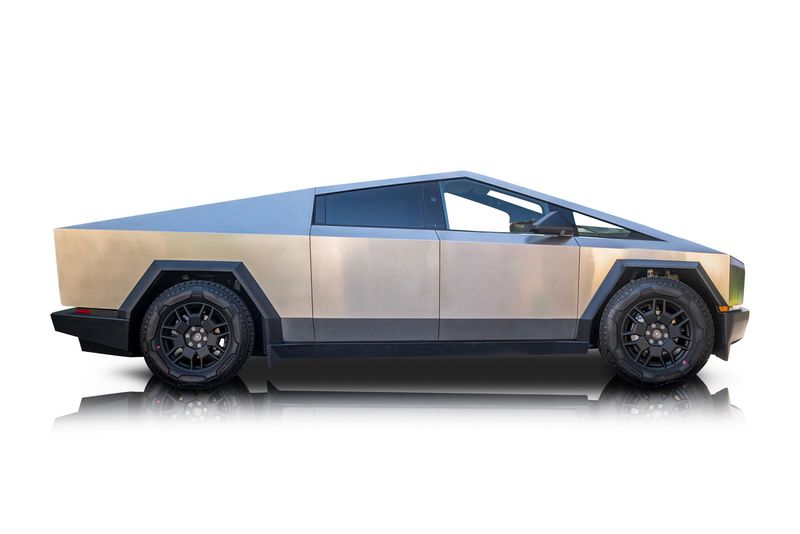 An incredible side shot photo of aTesla Cybertruck that you should buy.