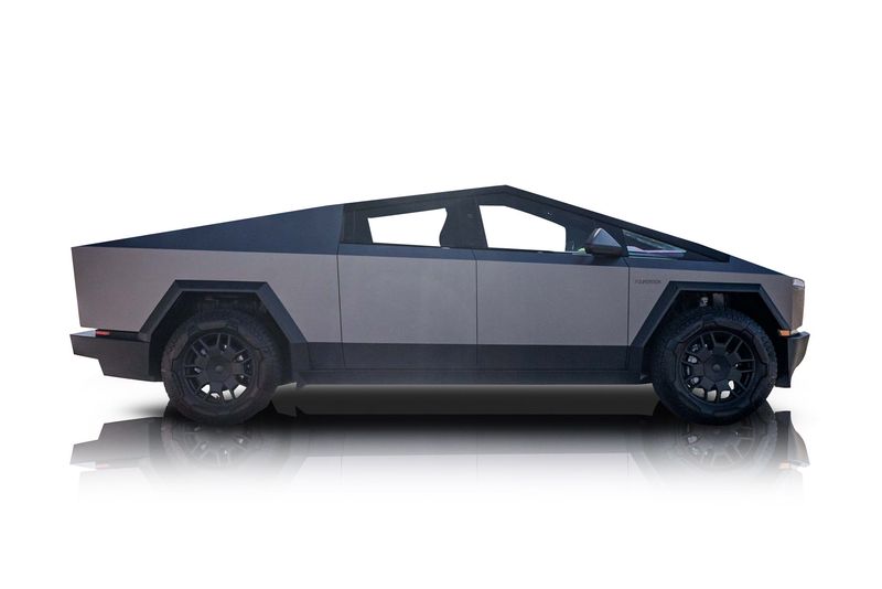 An incredible side shot photo of aTesla Cybertruck that you should buy.