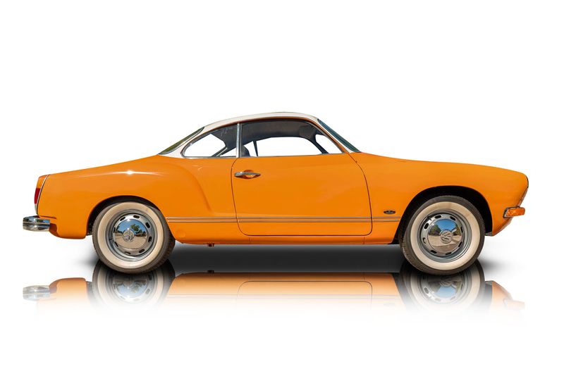 An incredible side shot photo of aVolkswagen Karmann Ghia that you should buy.