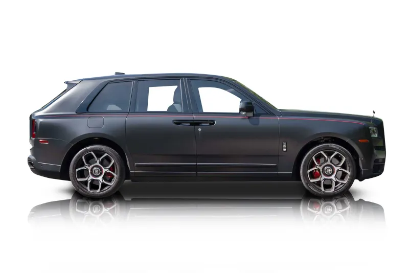 An incredible side shot photo of aRolls-Royce Cullinan that you should buy.