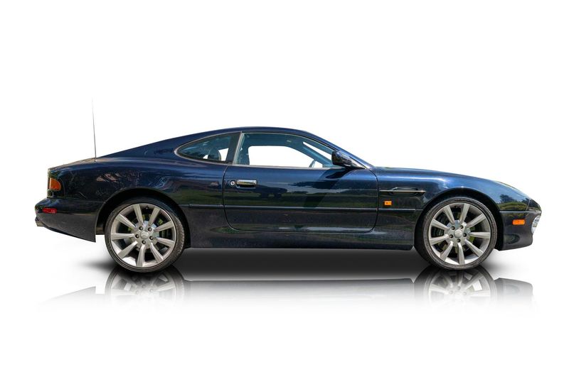 An incredible side shot photo of aAston Martin DB7 that you should buy.