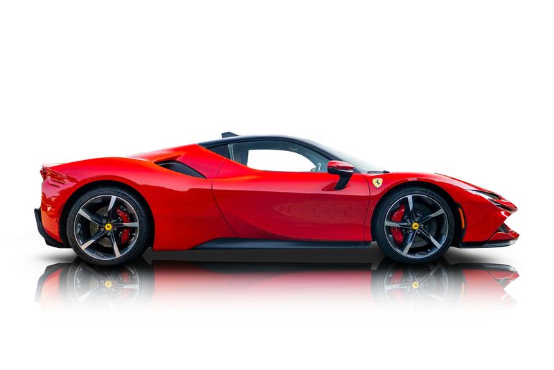 An incredible side shot photo of aFerrari SF90 that you should buy.