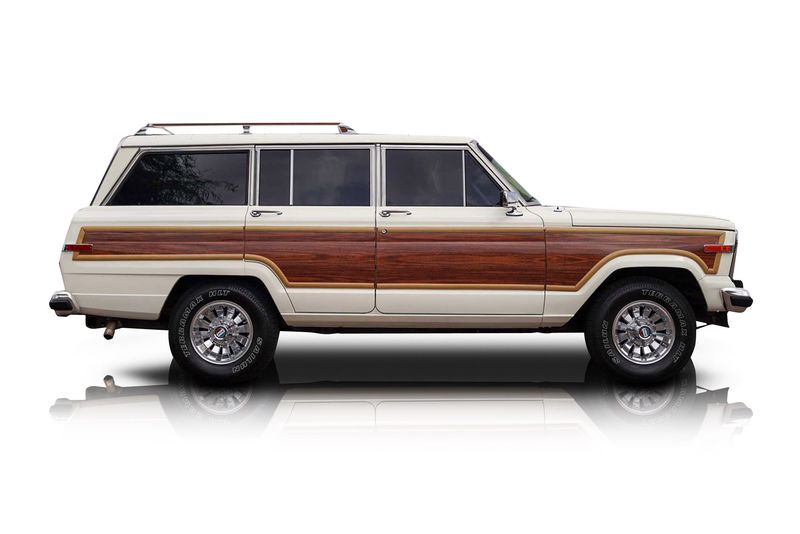 An incredible side shot photo of aJeep Grand Wagoneer that you should buy.