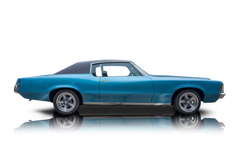An incredible side shot photo of aPontiac Grand Prix that you should buy.