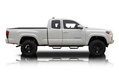 Passenger side photo of 2023 Toyota Tacoma
