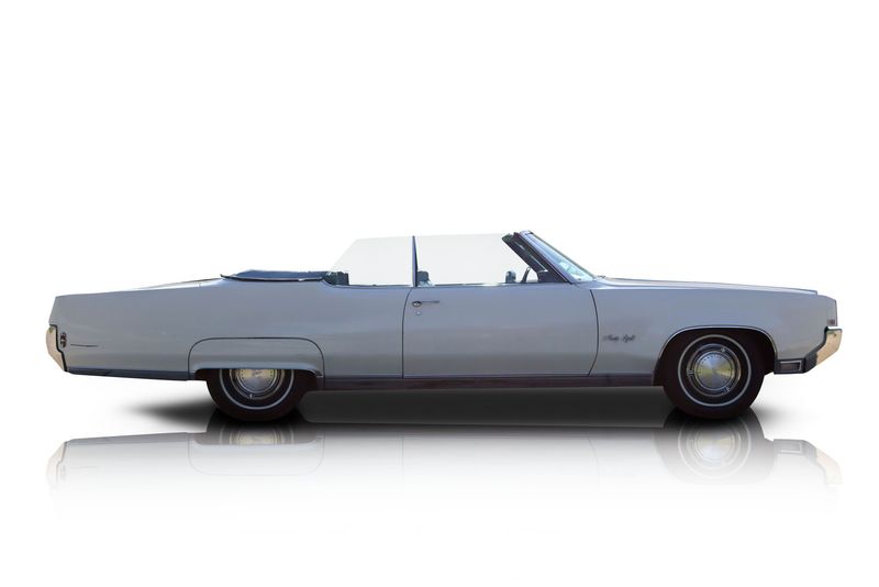 An incredible side shot photo of aOldsmobile 98 that you should buy.