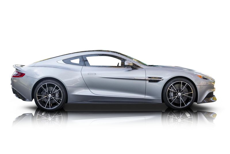 An incredible side shot photo of aAston Martin Vanquish that you should buy.