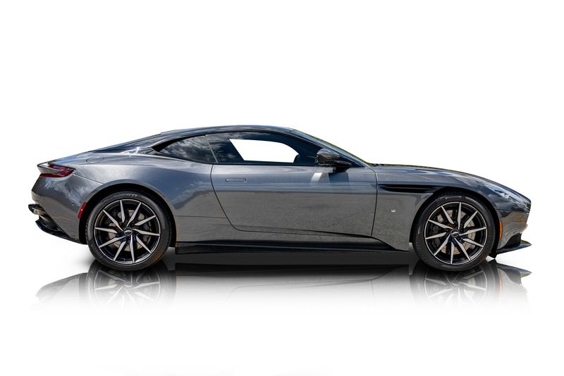 An incredible side shot photo of aAston Martin DB11 that you should buy.