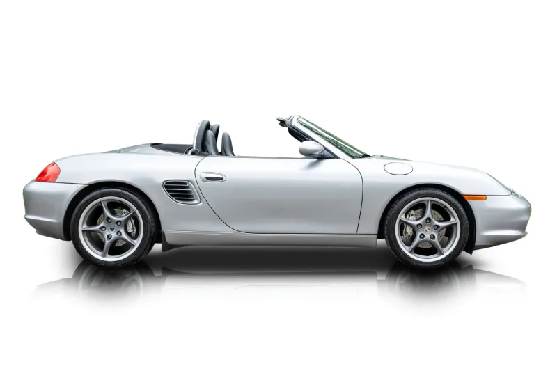 An incredible side shot photo of aPorsche Boxster that you should buy.