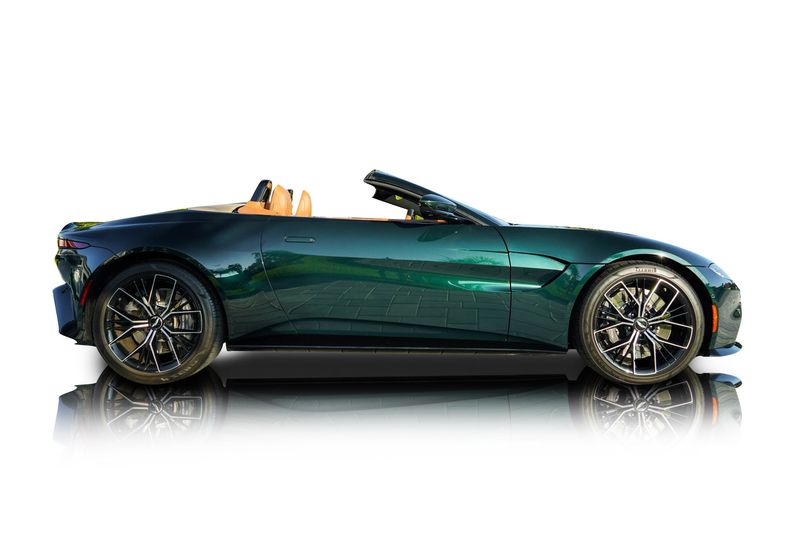An incredible side shot photo of aAston Martin Vantage that you should buy.