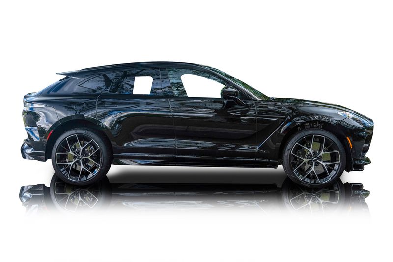 An incredible side shot photo of aAston Martin DBX that you should buy.