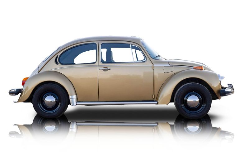 An incredible side shot photo of aVolkswagen Super Beetle that you should buy.