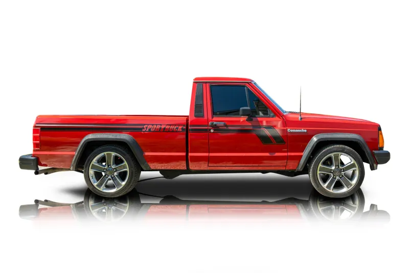 An incredible side shot photo of aJeep Comanche that you should buy.