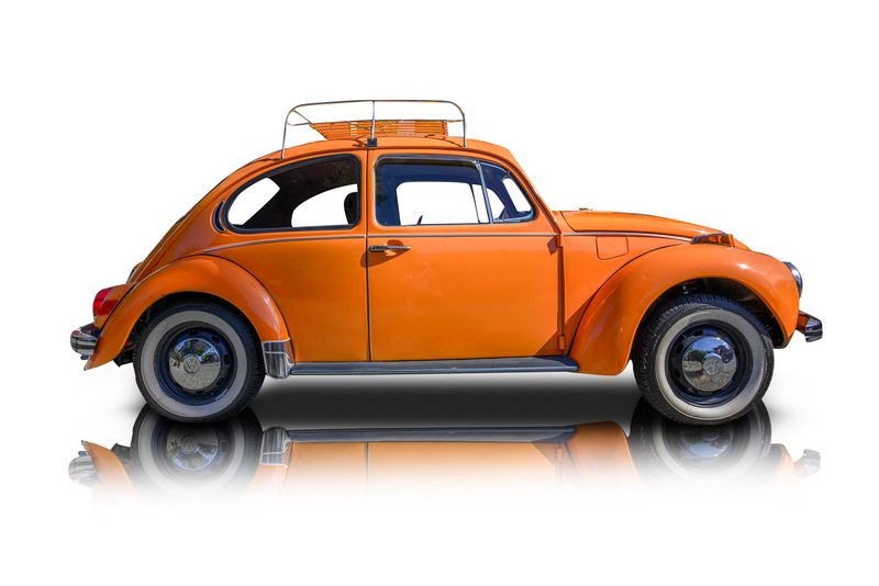 An incredible side shot photo of aVolkswagen Super Beetle that you should buy.