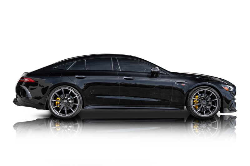 An incredible side shot photo of a car that you should buy.