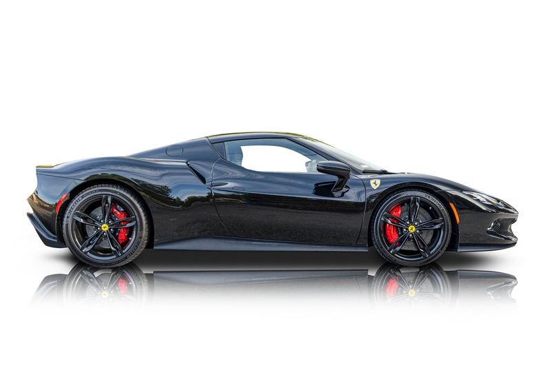 An incredible side shot photo of aFerrari 296 GTB that you should buy.