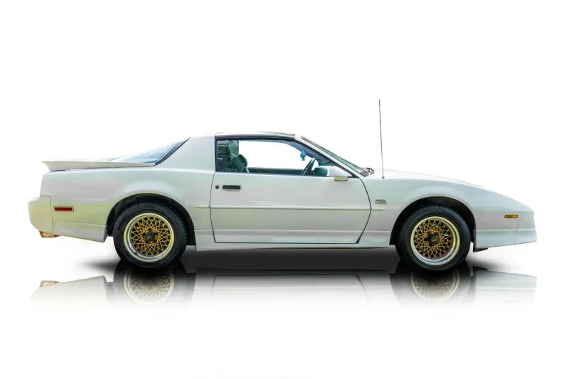 An incredible side shot photo of aPontiac Firebird that you should buy.
