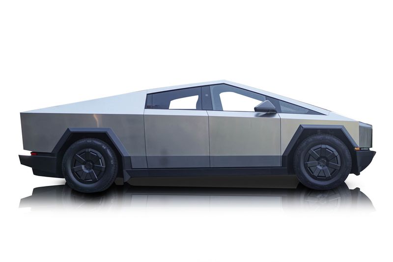 An incredible side shot photo of aTesla Cybertruck that you should buy.