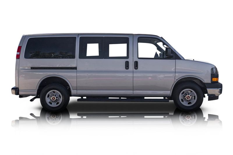 An incredible side shot photo of aGMC Savana that you should buy.